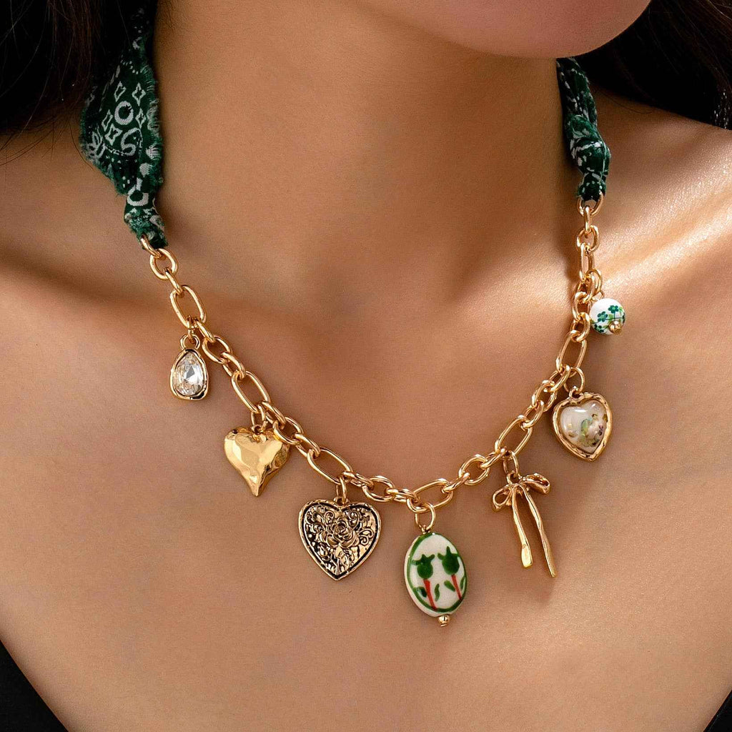 SCARF CHARM NECKLACE-PORCELAIN HEART BOW | 80N92717