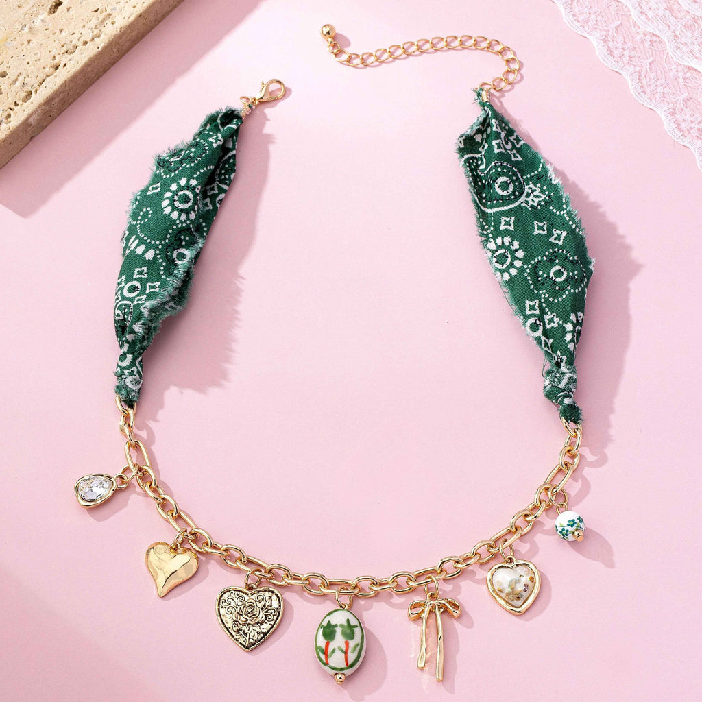 SCARF CHARM NECKLACE-PORCELAIN HEART BOW | 80N92717